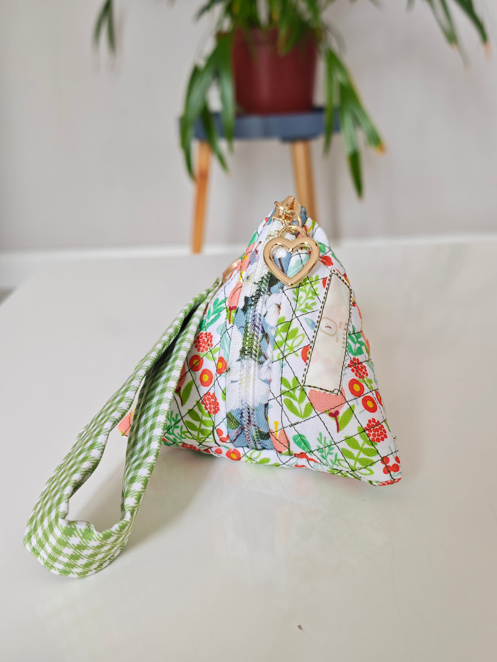 Triangular key pouch with wristlet