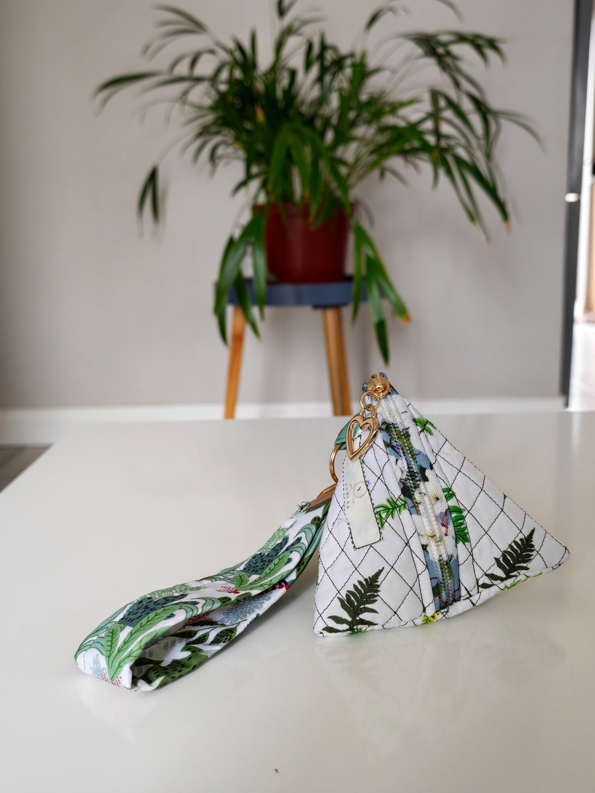 Triangular key pouch with wristlet