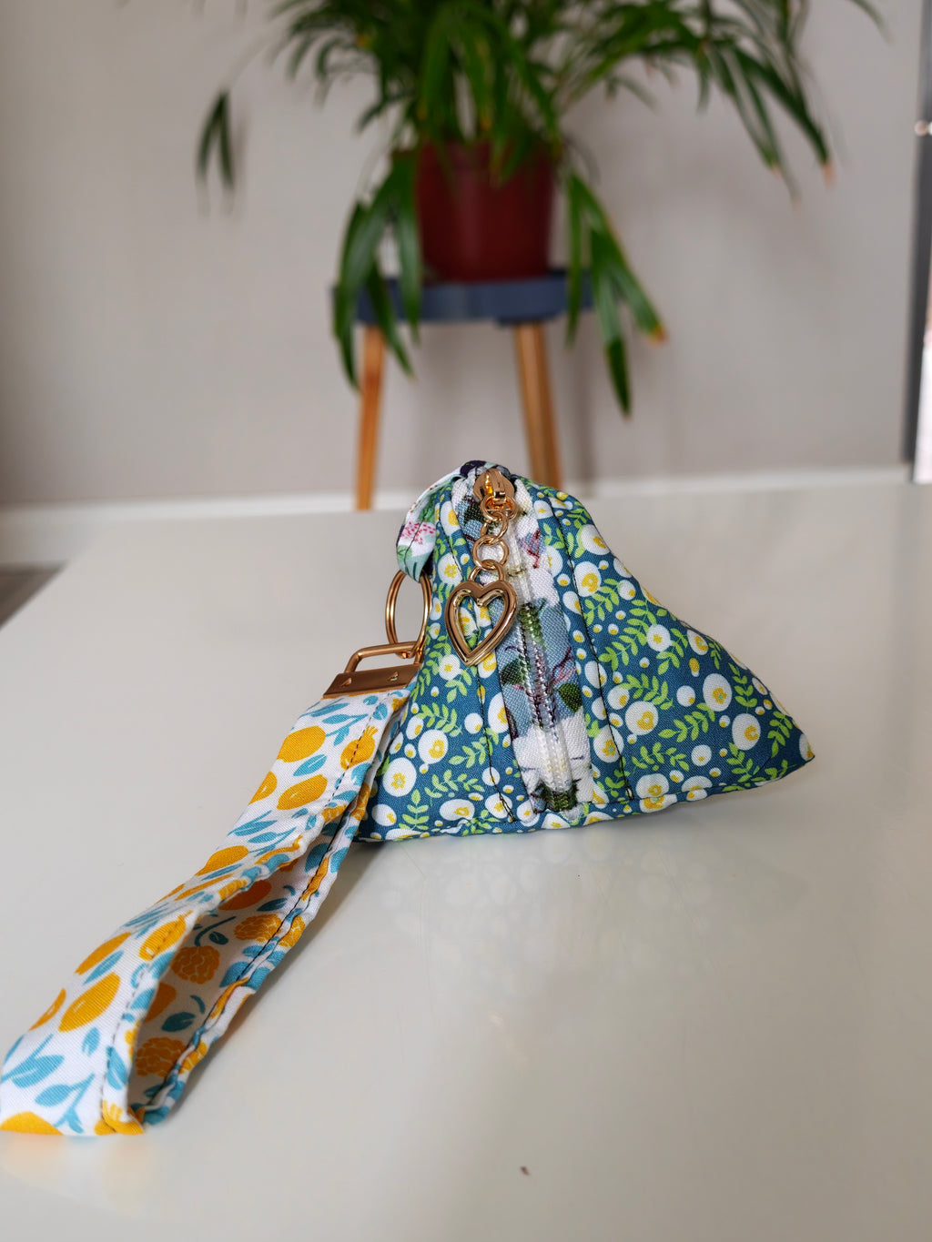 Triangular key pouch with wristlet