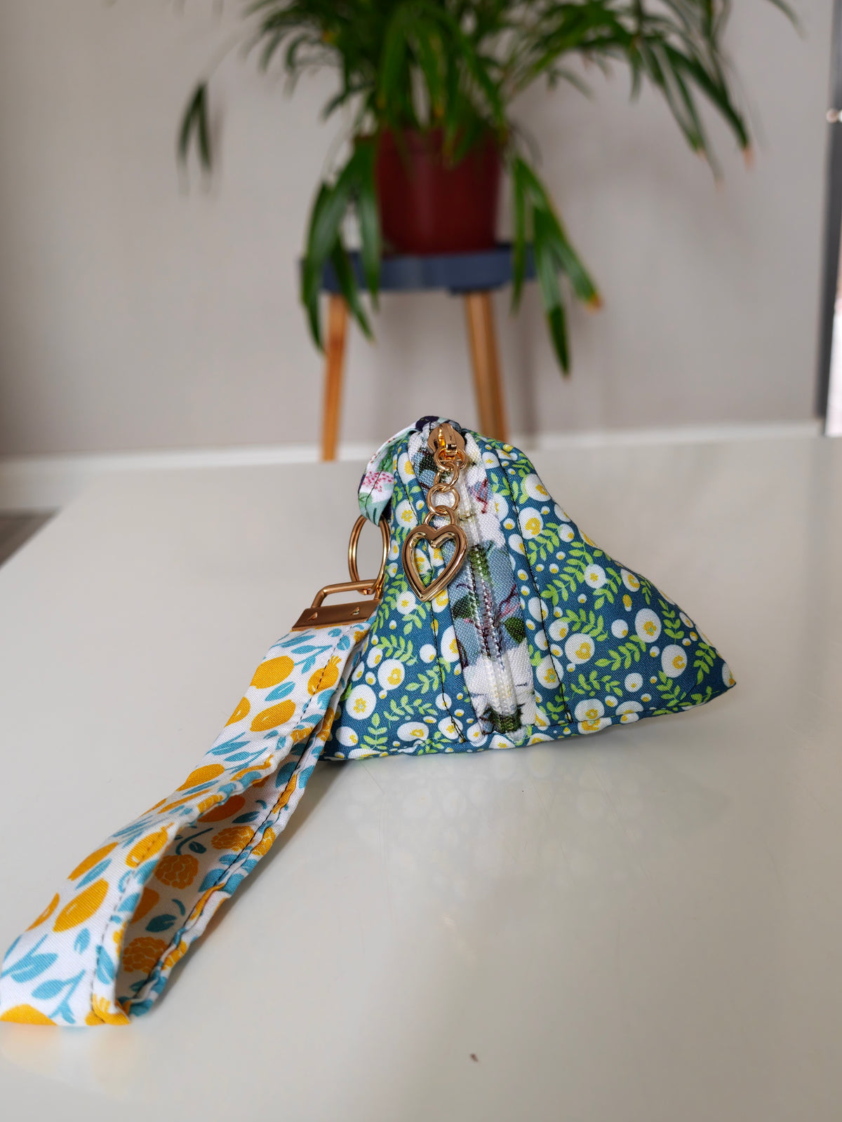 Triangular key pouch with wristlet