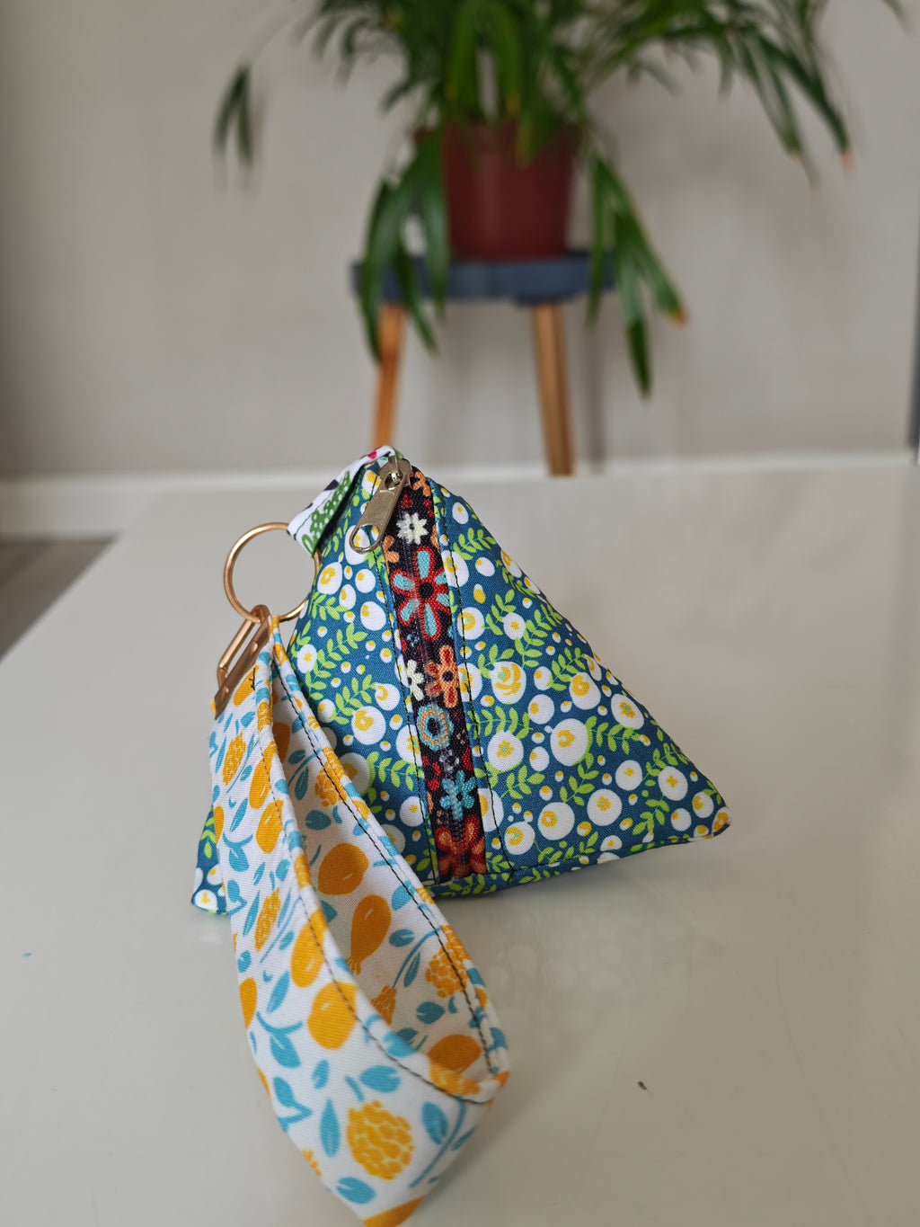 Triangular key pouch with wristlet