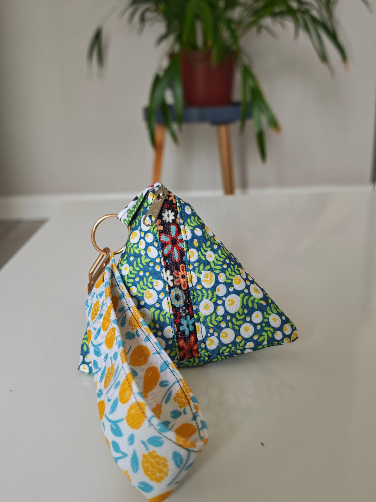 Triangular key pouch with wristlet