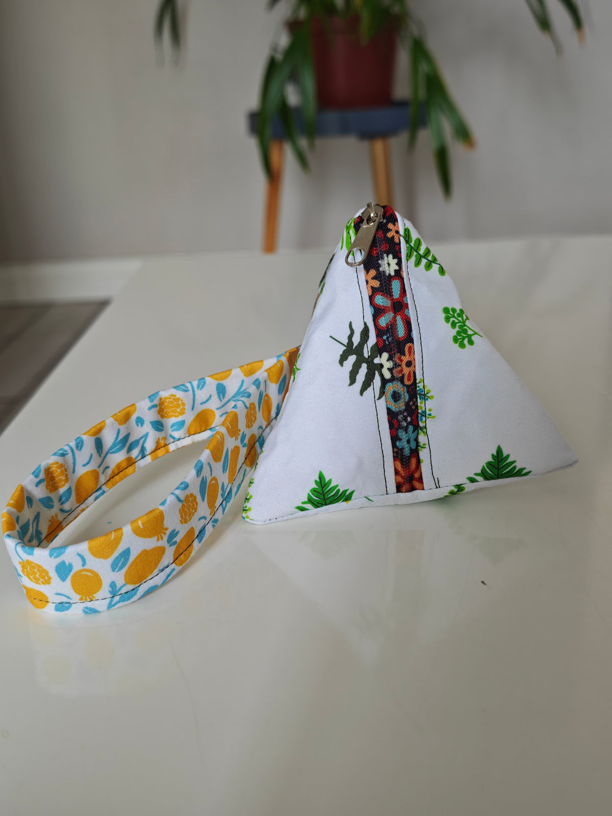 Triangular key pouch with wristlet