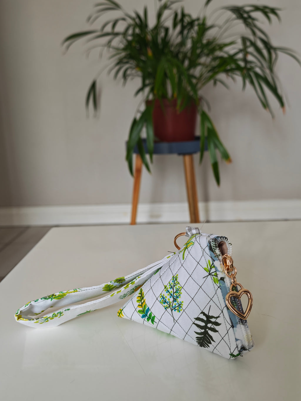 Triangular key pouch with wristlet